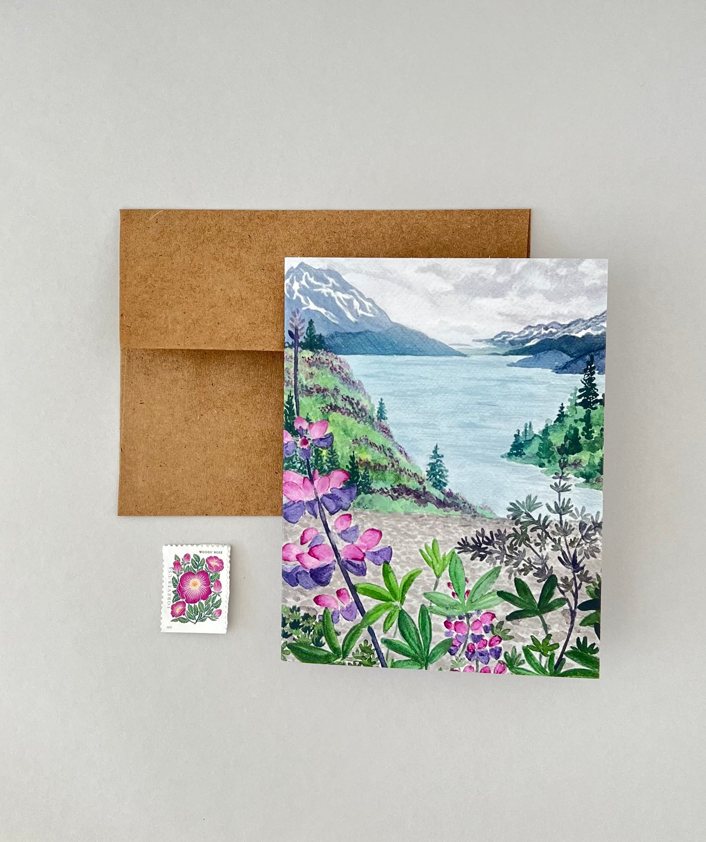 Kraft envelope, lupine landscape card and stamp (not included)