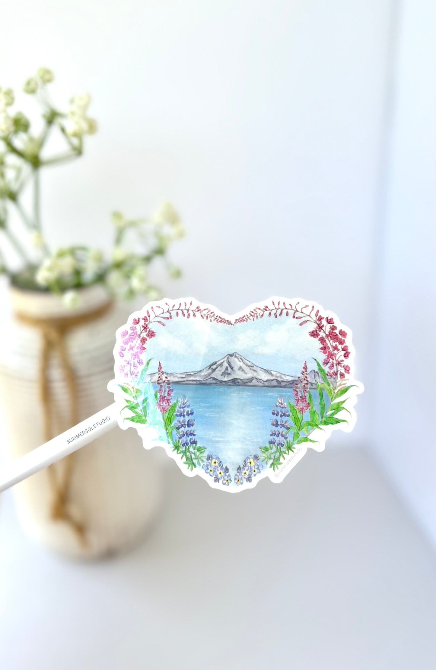 heart shaped florals and mountains